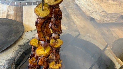 Barbeque with potatoes and onions